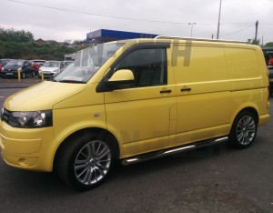 VW transporter T5 with 3 step stainless steel side bars and stainlees steel roof rails